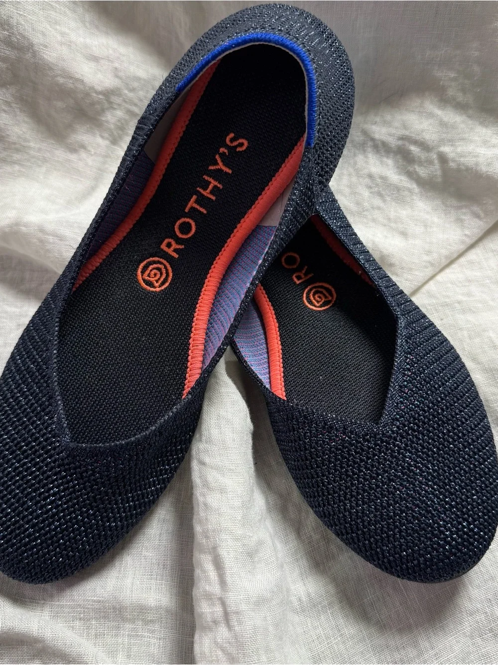 Rothy's Navy Flats with Coral and Royal Blue Trim